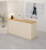 Comptoir de réception minimaliste noir Q101 avec ordinateur Apple pour les petites entreprises