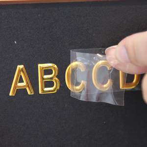 Etiqueta Adhesiva de Lujo 3D con <span class=keywords><strong>Logo</strong></span> Personalizado en Níquel Metálico Transparente por Transferencia UV y Termoadhesivo en Oro - Product Image 4