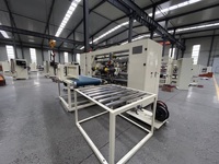 Machine à piquer semi-automatique à double pièce pour la fabrication de boîtes en carton ondulé