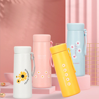 Fabricant moins cher randonnée sport de plein air eau chaude et froide enfants enfants école mignon cadeau bouteille d'eau en verre