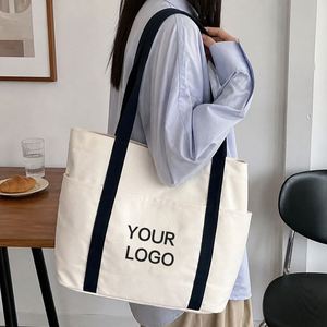 Sac en coton tendance avec logo personnalisé, sac fourre-tout réutilisable pour ordinateur portable, idéal pour le campus universitaire - Product Image 1