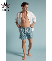 Shorts de plage pour hommes MLY OEM, personnalisés par sublimation, séchage rapide, légers, taille mi-haute, avec cordon de serrage, décontractés