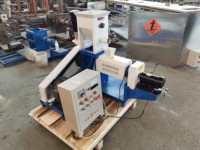Extrudeuse de traitement de granulés d'aliments secs et humides pour animaux de compagnie Chien Poisson Chat Poulet Machine de fabrication de granulés d'aliments pour animaux Moteur Composant central