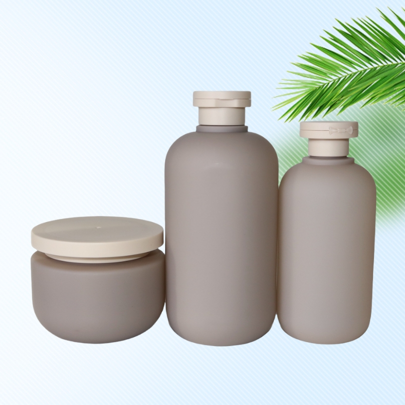 Set di bottiglie grige e barattolo