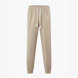 Pantalones casuales de primavera y otoño para hombre, estilo americano juvenil, deportivos y de ocio, de secado rápido, color sólido, con cordón ajustable. - Product Image 1