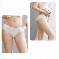 Sous-vêtements tricotés jetables pour femmes blanches emballés individuellement, confortables et respirants pour un usage quotidien