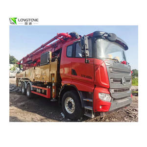 Pompe à béton d'occasion pour la construction, pompe à flèche Putzmeister avec télécommande - Product Image 1