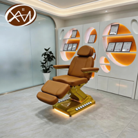 Table de massage électrique hydraulique pliable de luxe avec base en métal doré et extension incurvée personnalisée pour salon et salle de sport