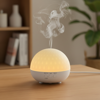 Diffuseur d'huiles essentielles au design moderne, humidificateur d'air en forme de goutte de pluie, diffuseur d'arômes pour la maison, le bureau et l'hôtel