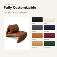 Fauteuil lounge en cuir cognac, capitonné, courbé, moderne, rembourré, pour hall d'hôtel, club, intérieur