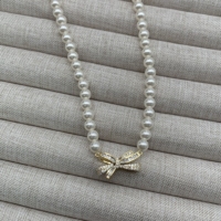 Nouveau collier pendentif rétro en laiton plaqué or avec perle chaîne de corde géométrique à la mode haut de gamme haut de gamme tempérament