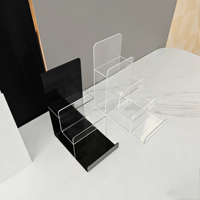 Étagère de présentation multi-niveaux en acrylique transparent, idéale pour l'affichage et l'organisation des sacs pour hommes et femmes sur les comptoirs de vente au détail