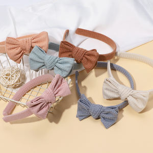 Nueva diadema de oreja de conejo de 12 Colores de Venta caliente europea y americana accesorios para el cabello de bebé - Product Image 1