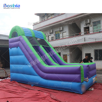 Toboggan gonflable commercial pour enfants, toboggan gonflable multicolore pour centre de divertissement familial