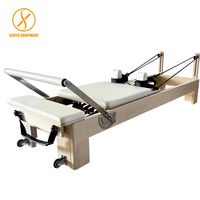 Machine de Pilates Reformer en Bois Classique Moderne, Durable, Portable, Design Ergonomique pour le Yoga ou la Salle de Sport à Domicile, Entraînement Professionnel du Core