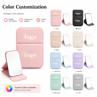 Miroir de maquillage pliable portable avec logo personnalisé, miroir de vanité compact avec housse en PU, options multicolores pour les voyages, les cadeaux et l'usage quotidien