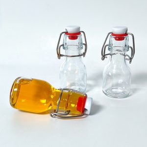 Envase de Vidrio Reutilizable con Tapa Abatible y Tapón de Goma Hermético para Almacenamiento de Té Frío, Aceite de Oliva, Vinagre y Condimentos de Cocina - Product Image 6