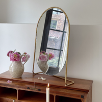 Vente en gros vanité de table élégante et moderne luxe miroir de maquillage ovale cosmétique en métal doré décoration pour la chambre à coucher