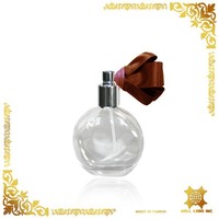 Atomiseur de parfum cylindrique en verre personnalisé Well Lord Inc. 100ml/200ml/300ml avec sérigraphie, décoration florale et logo – Taïwan