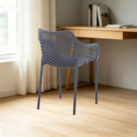 Chaise d'hôtel en plastique en gros, siège fixe moderne pour lieux publics, fauteuil ajouré jaune empilable pour patio, jardin et extérieur