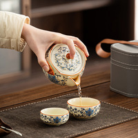Service à thé Kung Fu en céramique Ru de style chinois moderne haut de gamme, motif lotus bleu et blanc entrelacé, portable pour usage domestique, personnalisable