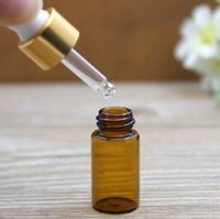Mini flacon compte-gouttes en verre transparent ambré avec bouchon doré pour huiles essentielles, parfums et cosmétiques liquides