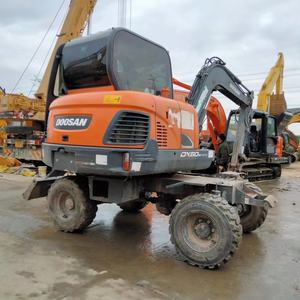 Second Handexcavator Develon DX 60W Fuerte potencia y capacidad de trabajo Sistema de energía fuerte Control de consumo de combustible eficiente - Product Image 2