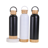 Bouteille isotherme en acier inoxydable 304 sans BPA de 500 ml/17 oz avec couvercle et base en bambou, et poignée intégrée