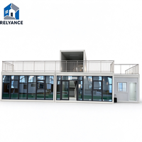 Conteneur-chalet RELYANCE pour la Guyane, clé en main, avec terrasse et escalier, pour usage bureautique et hospitalier, mobile et portable, installation rapide, 20 pieds