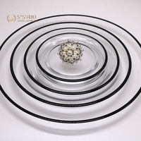 Assiette de présentation ronde de luxe en verre transparent avec bord doré pour mariages
