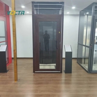Ascenseur hydraulique moderne à porte simple pour appartement, avec commande manuelle