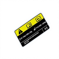 Étiquette de sécurité personnalisée imprimée avec un design jaune et noir à fort contraste, résistante aux huiles et aux produits chimiques, pour l'entretien des machines