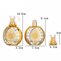 Flacon de parfum rond en verre doré de luxe de haute qualité 50 ml avec diffuseur à bâtonnets, bouchon à vis, gravure et sérigraphie, livraison rapide