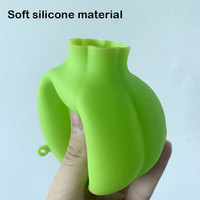 OEM & ODM 8.2*7.5cm Vente en gros Outil d'épluchage de cuisine créatif et utile Éplucheur d'ail en silicone à roulettes