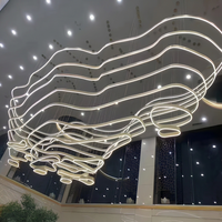 Luminaire suspendu de luxe suspendu de grand plafond arrondi doré d'hôtel lustre décoratif moderne en cristal pour escalier à led