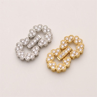 Vente en gros de fermoirs plaqués or 18 carats en laiton de Guangdong pour la fabrication de colliers de perles