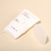 Tube vide personnalisé blanc argenté 100 ml, emballage écologique, applicateur de massage en silicone pour crème blanchissante pour le cou
