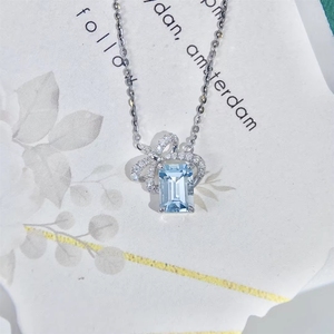สร้อยคอทองคำแท้ 18k ยี่ห้อซินฟลาย พร้อมจี้รูปโบว์ประดับเพชรอะความารีน - Product Image 6