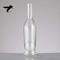 Bouteille de tequila en verre cylindrique de 700 ml avec logo personnalisé, design doré estampé à chaud, base lourde, bouteille de liqueur haut de gamme, prête à diffuser