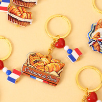 Vente en gros France Paris Porte-clés en résine avec simulation 3D de croissant et baguette, thème cuisine française, et pendentif chef Tour Eiffel Paris pour breloque de sac
