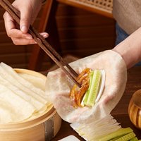 Crêpes printanières faites à la main pures estampage à chaud sans huile friture sans additifs petits pains cuits au four au goût sucré congelés tous les ingrédients naturels