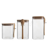 Bocaux carrés en verre borosilicate en gros avec couvercle et cuillère en bambou pour le stockage de gelée, de sucre et d'aliments