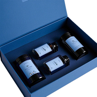 Boîte de pot de bougie magnétique en forme de livre imprimé personnalisé mousse d'emballage en carton rigide pour les cadeaux cosmétiques revêtement UV options de gaufrage