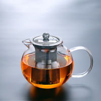 Théière moderne écologique en verre résistant à la chaleur avec filtre épaissi Conception de fleur de pommier pour le brassage du thé domestique