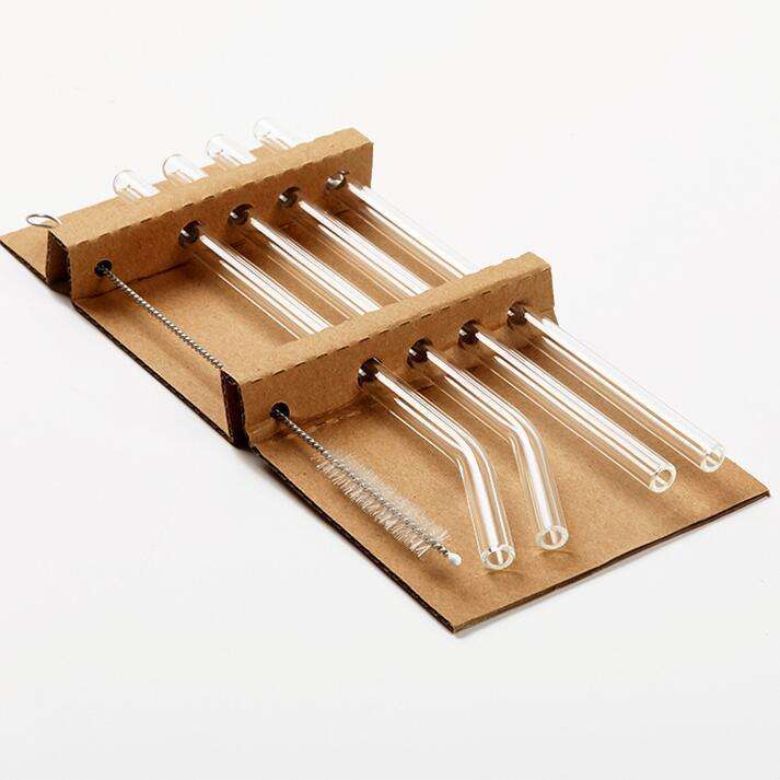 Four straws + a cleaning brush