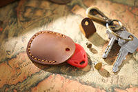 Porte-clés portable personnalisé avec pochette à monnaie en cuir véritable à la mode Tracker Cover Car Hanging Mini Storage Keychain