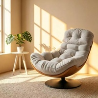 Fauteuil pivotant confortable en tissu suédé, design moderne et ergonomique, structure en acier, mobilier de salon