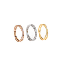 Bague unisexe en acier inoxydable style japonais et coréen, sertie de zircons entrelacés, design de niche, allure haut de gamme, tendance et populaire