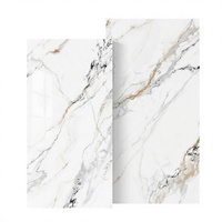 Dalles en porcelaine effet marbre Calacatta Gold poli et émaillé 750x1500mm pour salon