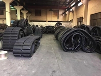 Chenilles en caoutchouc de qualité supérieure pour le fabricant durable de fournisseur de pièces de train d'atterrissage d'excavatrice de chargeur de moissonneuse